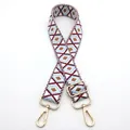 Close-up of geometric diamond pattern strap with polished gold-tone metal hardware - No. 9 Wine Red White Light Blue