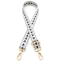 Detail of adjustable bag strap with black V-shaped chevron pattern and gold metal hooks - No.5 White with Black