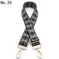 Detailed view of wide woven shoulder strap with geometric diamond pattern and gold hardware - No. 25 Dark Grey