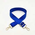 Detail view of adjustable royal blue nylon bag strap with polished gold metal hardware - Sky Blue