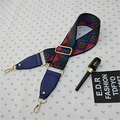 Detail of colorful geometric woven shoulder strap with gold metal buckles and leather ends - Style 3 Blue