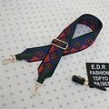 Detail of adjustable woven bag strap with colorful geometric rhombus pattern and gold hardware - Style 3 Green