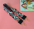 Ethnic style woven handbag strap with red white and black geometric patterns - Rainbow