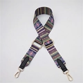 Macro shot of ethnic bohemian style adjustable purple woven bag strap with golden buckles - Striped Black