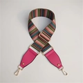 Macro view of colorful striped replacement shoulder strap with gold metal hardware - Rose Red