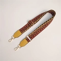 Close-up of adjustable woven shoulder strap with burgundy and yellow geometric patterns - Dark with Yellow
