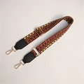 Detail of colorful woven ethnic strap with gold metal buckles and black leather ends - Dark with Black