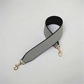 Close-up of wide PU leather replacement bag strap with golden lobster clasps - Gray