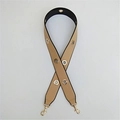 Close-up of wide PU shoulder strap with gold eyelets and swivel lobster clasps - Khaki