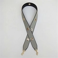 Detail of grey PU leather bag strap featuring gold metal eyelets and lobster clasps - Gray