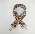 Close-up of leopard print wide replacement strap with gold metal buckles and adjuster - Light Leopard