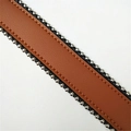 Close-up of brown pebbled leather strap featuring silver round studs and neat stitching - 120cm / Brown (Gunmetal Chain)