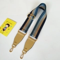Detail of adjustable wide striped nylon shoulder strap with golden metal swivel hooks - Blue Stripe With Khaki Leather