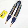 Detail of adjustable wide striped strap with golden hardware and leather connector - Blue Stripes + Blue