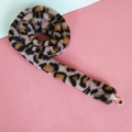 Detail of faux fur leopard print bag strap with durable gold metal lobster clasp - Pink Leopard
