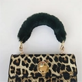 Leopard print handbag with deep green faux fur handle and golden hardware details - Green