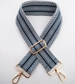 Close-up of navy blue and white striped woven bag strap with light gold metal hardware - Blue White Stripe With Silver Buckle