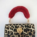 Leopard print handbag featuring a fluffy red faux fur handle and golden metal buckle - Burgundy