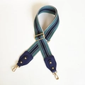 Close-up of adjustable woven shoulder strap with green and blue geometric pattern - Blue Strap with Royal Blue End
