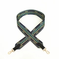 Close-up of wide bohemian geometric woven bag strap with golden swivel snap hooks - Rhombus with Black Leather (Silver Buckle)
