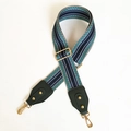 Detail of adjustable wide woven bag strap with navy and teal geometric embroidery and gold hooks - Blue Strap + Green