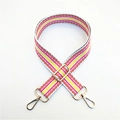 Detail of adjustable wide bag strap with pink and yellow geometric stripes and gold buckles - Silver Clasp / Pink