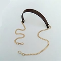 Detail of brown PU leather shoulder strap with golden metal chains and lobster clasps - 120cmx2.2cm / Brown