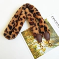 Detail of leopard print faux fur shoulder strap with gold metal hooks and leather trim - Leopard Brown