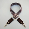 Detail view of woven pattern and brown leather ends with golden metal buckle - 3.8cm Wide / Coffee & Coffee