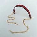 Detail view of burgundy PU leather handle with gold metal chains and lobster clasps - 120cmx2.2cm / Burgundy