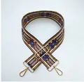 Detail of wide ethnic style woven bag strap with colorful stripes and gold hardware - All-match Style