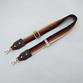 Close-up of adjustable striped bag strap with gold metal buckles and leather ends - Style 4 Coffee