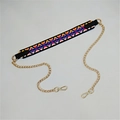 Detail of a colorful geometric ethnic strap with golden metal chain and lobster clasps - No.20 Black Border Pattern
