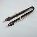 Detail of adjustable ethnic striped bag strap with gold metal hooks and leather joints - Coffee Style 3