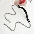Detail of silver metal chain with black pebbled leather shoulder strap and lobster clasps - Lychee Black + Gold Chain