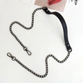 Detail of black pebbled leather shoulder strap with gunmetal chain and lobster clasps - Cross Black + Silver Chain