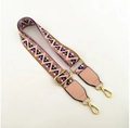 Detail of colorful geometric woven shoulder strap with pink leather ends and gold hooks - Pink (Pink Trim)