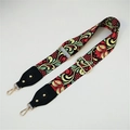 Detail of vintage floral wide bag strap with gold metal buckles and black leather trim - Vine Pattern Black Leather