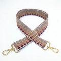 Detail of colorful woven shoulder strap with geometric patterns and golden lobster clasps - No.13 Khaki