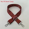 Close-up of wide ethnic woven strap with red yellow patterns and silver metal hooks - No. 79 / Silver