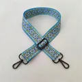 Close-up of wide sky blue fabric bag strap with daisy print and gun-metal clasp - No. 91 Gunmetal Buckle