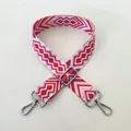 Dettaglio fibbia argento n. 96 su tracolla intrecciata con motivi geometrici etnici - N. 96 Fibbia Argentata