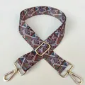 Detail of bohemian geometric patterned strap with gold metal lobster clasps and buckle - No. 31 Gold Buckle