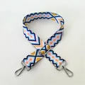 Close-up of geometric pattern replacement bag strap with silver metal swivel hooks - No. 97 Silver Buckle