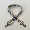 Macro detail of geometric patterned bag strap with gun-metal lobster clasp and adjuster - No. 93 Gunmetal Buckle