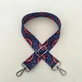 Detail of No. 57 silver buckle and geometric ethnic pattern on adjustable bag strap - Style 57 Silver Buckle