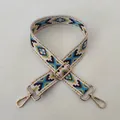 Close-up of ethnic style replacement shoulder strap with gold-tone zinc alloy buckle - No. 93 Gold Buckle