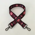 Close-up of ethnic floral replacement strap with black base and gunmetal hooks - No. 83 / Gunmetal