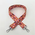 Detail of adjustable orange bag strap with blue fish pattern and silver metal hardware - Style 58 Silver Buckle