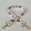 Detail of adjustable wide shoulder strap with hot air balloon print and gold hardware - No. 33 Gold Buckle